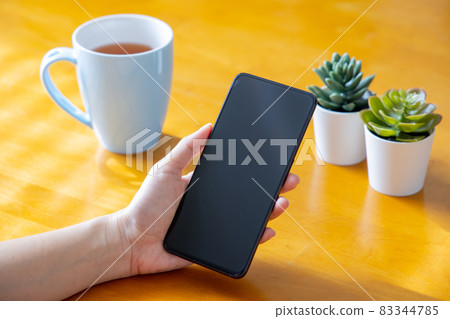 woman use blank screen smartphone woman use blank screen smartphone 83344785