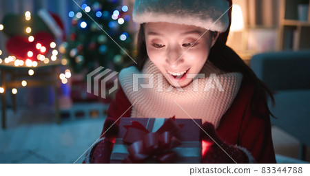 asian woman open present box asian woman open present box 83344788