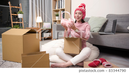 woman open online shopping parcel woman open online shopping parcel 83344790