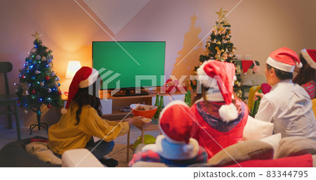 friends watch TV while Christmas 83344795
