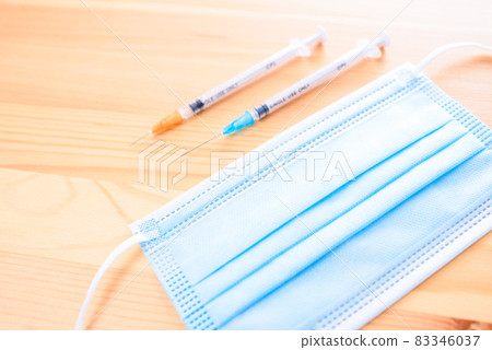 Syringe and surgical mask, prevention of new coronavirus infection in Japan, prevention of spread of infection, overcoming 83346037