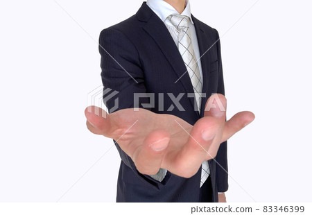 A businessman who puts something on his hand A businessman who puts something on his hand 83346399