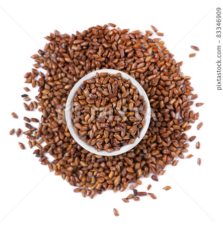 Cassia tora beans in ceramic bowl, isolated on white background. Sicklepod or Senna obtusifolia. Clipping path. Top view. Cassia tora beans in ceramic bowl, isolated on white background. Sicklepod or Senna obtusifolia. Clipping path. Top view. 83346909