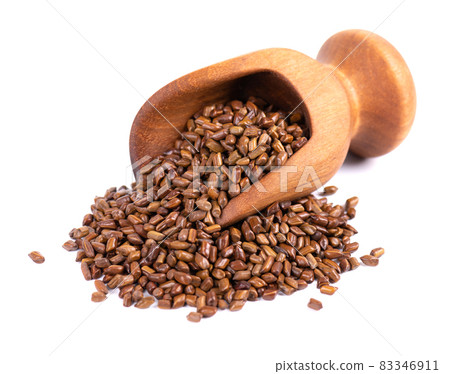 Cassia tora beans in wooden scoop, isolated on white background. Sicklepod or Senna obtusifolia. Clipping path. Cassia tora beans in wooden scoop, isolated on white background. Sicklepod or Senna obtusifolia. Clipping path. 83346911
