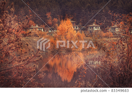 Autumn landscape with lake and houses, Bulgaria Autumn landscape with lake and houses, Bulgaria 83349683