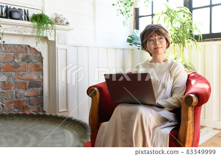 A young lady who operates a personal computer A young lady who operates a personal computer 83349999