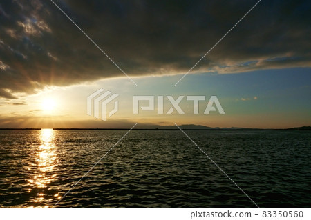 Autumn evening view from the coast 83350560