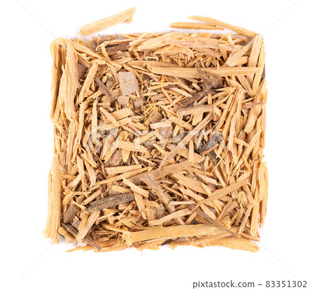 Muira Puama herbal tea, isolated on white background. Natural potency wood, medicinal plant, dry tea. Ptychopetalum olacoides. Top view. 83351302