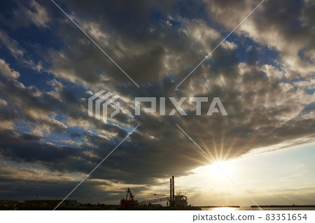 Autumn evening view and crane ship 83351654