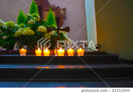 Church candles in abstract church 83352045