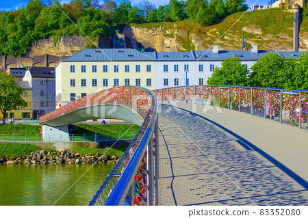 The bridge fence covered with locks in Salzburg 83352080