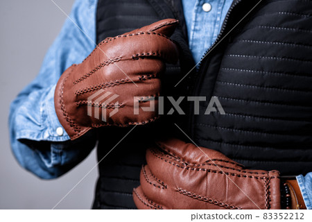 wearing the gloves 83352212