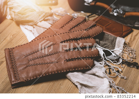 closeup brown leather gloves 83352214