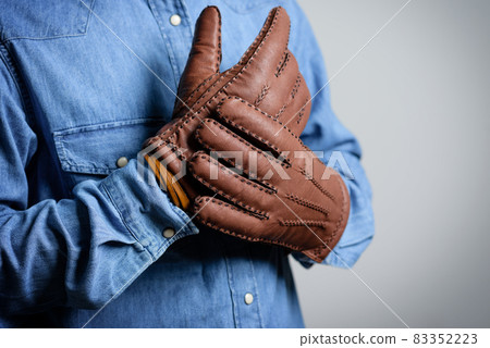 wearing the gloves wearing the gloves 83352223