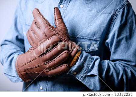 wearing the gloves wearing the gloves 83352225
