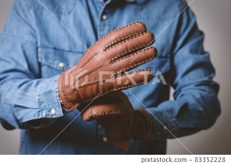 wearing the gloves wearing the gloves 83352228