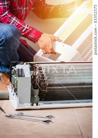 repairing the air conditioner 83352375