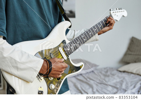 Teenager Playing Guitar Close Up Teenager Playing Guitar Close Up 83353104