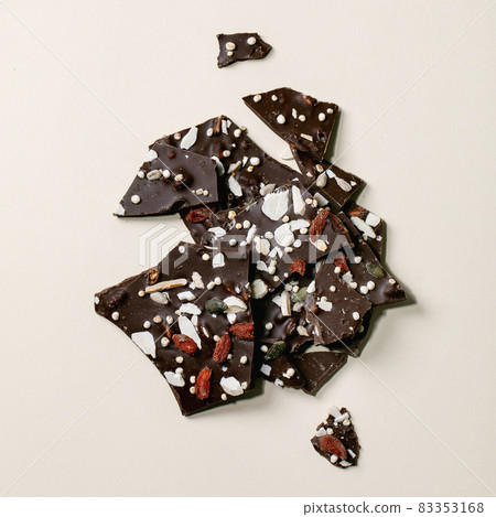 Handmade chopped dark chocolate with different superfood Handmade chopped dark chocolate with different superfood 83353168