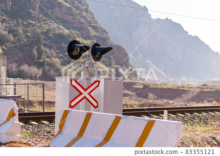 Closeup of level crossing lights 83355121