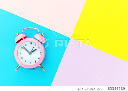 Ringing twin bell classic alarm clock isolated on blue yellow pink pastel colorful geometric background. Rest hours time of life good morning night wake up awake concept. Flat lay top view copy space. Ringing twin bell classic alarm clock isolated on blue yellow pink pastel colorful geometric background. Rest hours time of life good morning night wake up awake concept. Flat lay top view copy space. 83355289