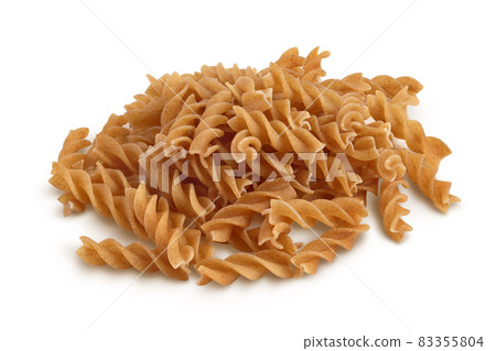 Wolegrain fusilli pasta from durum wheat isolated on white background with clipping path and full depth of field. 83355804