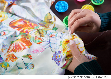 seamstress tailor using beads decorating dress in atelier seamstress tailor using beads decorating dress in atelier 83362943