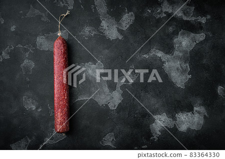 Delicious sausage, on black dark stone background, top view flat lay, with copy space for text Delicious sausage, on black dark stone background, top view flat lay, with copy space for text 83364330
