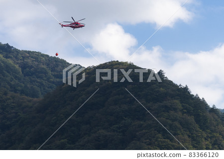 Ogochi Dam and helicopter 83366120