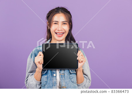 woman confident smiling show blank screen with tablet computer woman confident smiling show blank screen with tablet computer 83366473