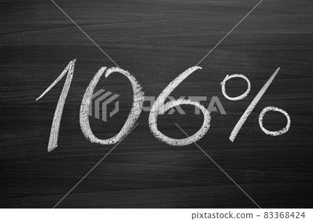 106 percent header written with a chalk on the blackboard 106 percent header written with a chalk on the blackboard 83368424