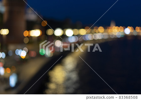 Blurred abstract background night city lights defocus Blurred abstract background night city lights defocus 83368508