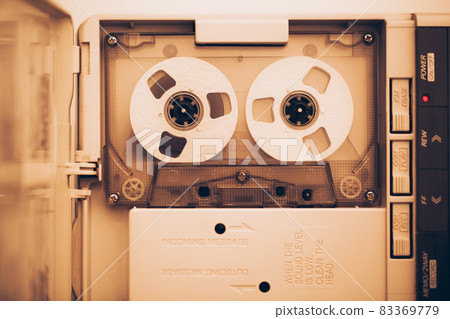 vintage audio tape compact cassette, sepia tone 83369779