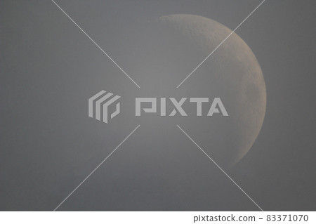 Crescent in a fog 83371070