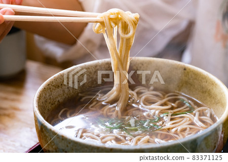 Image of eating warm soba 83371125