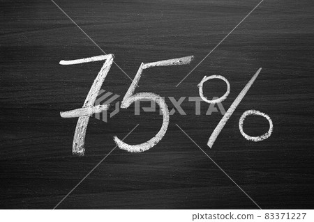 75 percent header written with a chalk on the blackboard 75 percent header written with a chalk on the blackboard 83371227