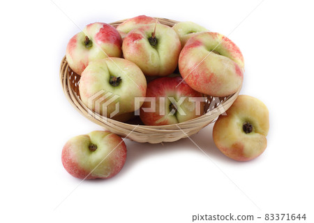 Flat peach (doughnut peach, donut peach, UFO peach, peento peach, saucer peach). Ancient Chinese variety "Pan tao". Delicacy Flat peach (doughnut peach, donut peach, UFO peach, peento peach, saucer peach). Ancient Chinese variety "Pan tao". Delicacy 83371644