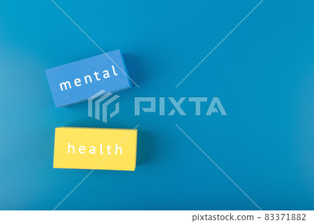 Mental health text written on colorful blue and yellow rectangles on dark blue background with copy space Mental health text written on colorful blue and yellow rectangles on dark blue background with copy space 83371882