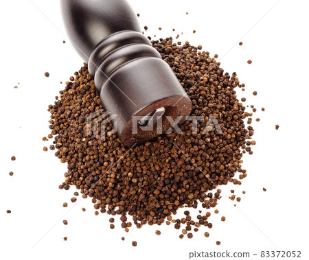 pepper mill on peppercorns heap, isolated on white 83372052