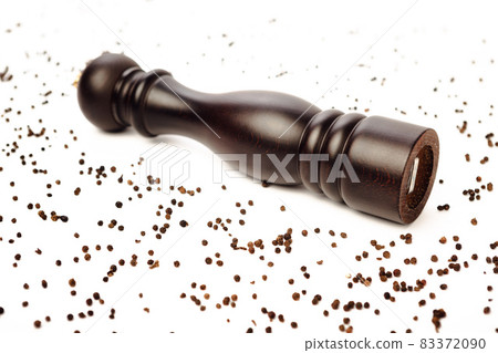 pepper mill and peppercorns, isolated on white 83372090