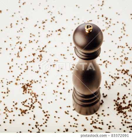 pepper mill and peppercorns, white background 83372091