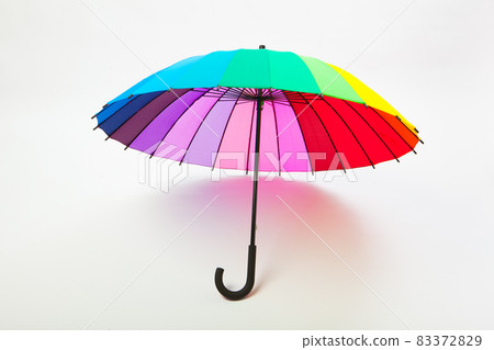 multicolored umbrella on white background 83372829