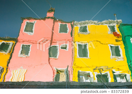 abstract water reflection of colorful houses in Burano, Venice, Italy abstract water reflection of colorful houses in Burano, Venice, Italy 83372839