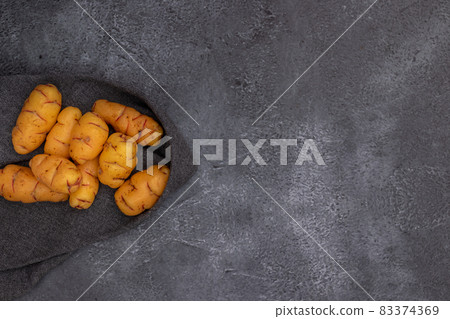 Group of ollucos, tuber used in Peruvian cuisine 83374369