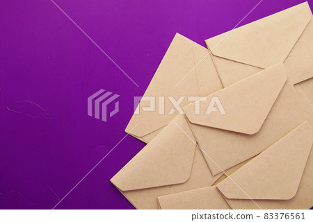 envelope on p on purple background on top view envelope on p on purple background on top view 83376561