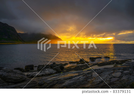 Sunset over Tungeneset beach on Senja island in northern Norway 83379131