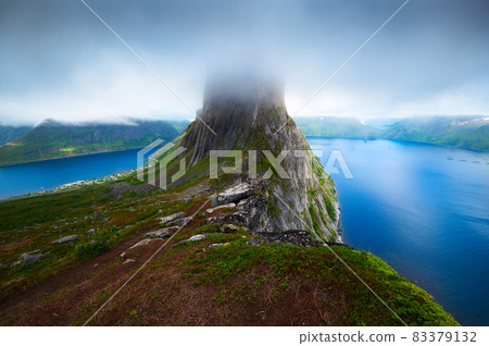 Segla mountain on Senja island in northern Norway as seen from the Hesten trail Segla mountain on Senja island in northern Norway as seen from the Hesten trail 83379132