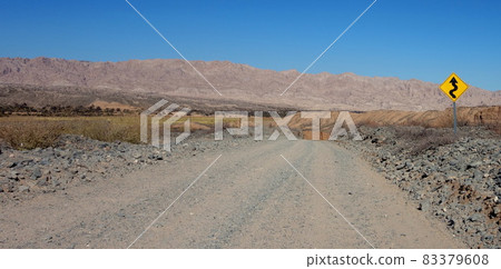 empty road on desert landscape, dry mountainous area, road trip empty road on desert landscape, dry mountainous area, road trip 83379608