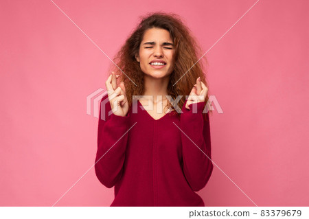 Photo of young emotional attractive woman with sincere emotions wearing trendy clothes isolated over Photo of young emotional attractive woman with sincere emotions wearing trendy clothes isolated over 83379679