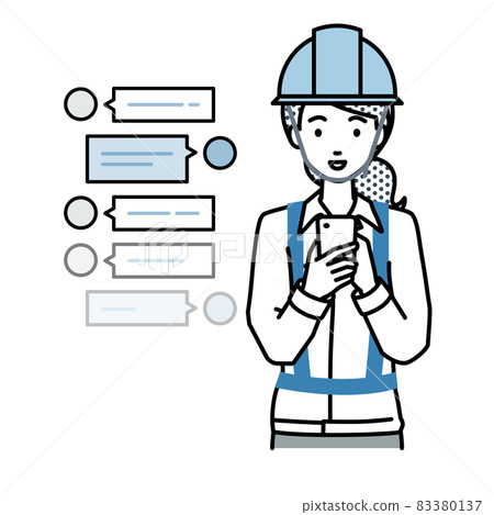 A woman at a construction site who stands up and has a fun chat conversation on her smartphone A woman at a construction site who stands up and has a fun chat conversation on her smartphone 83380137